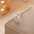 Silver palm motif ring