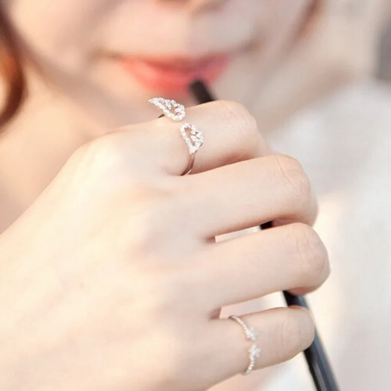 Angel wings ring with rhinestones