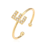 Adjustable personalized ring with initial e