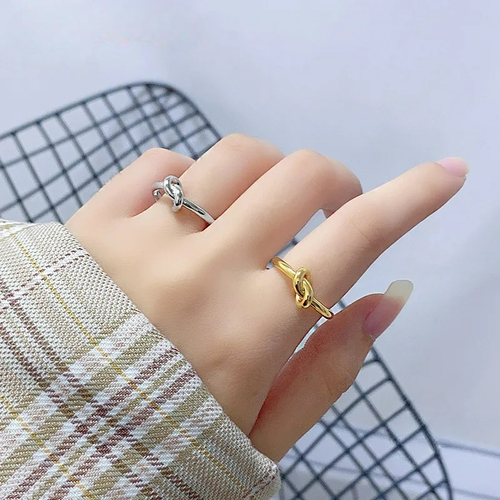 Adjustable knot silver ring