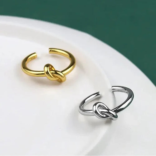 Adjustable knot gold ring