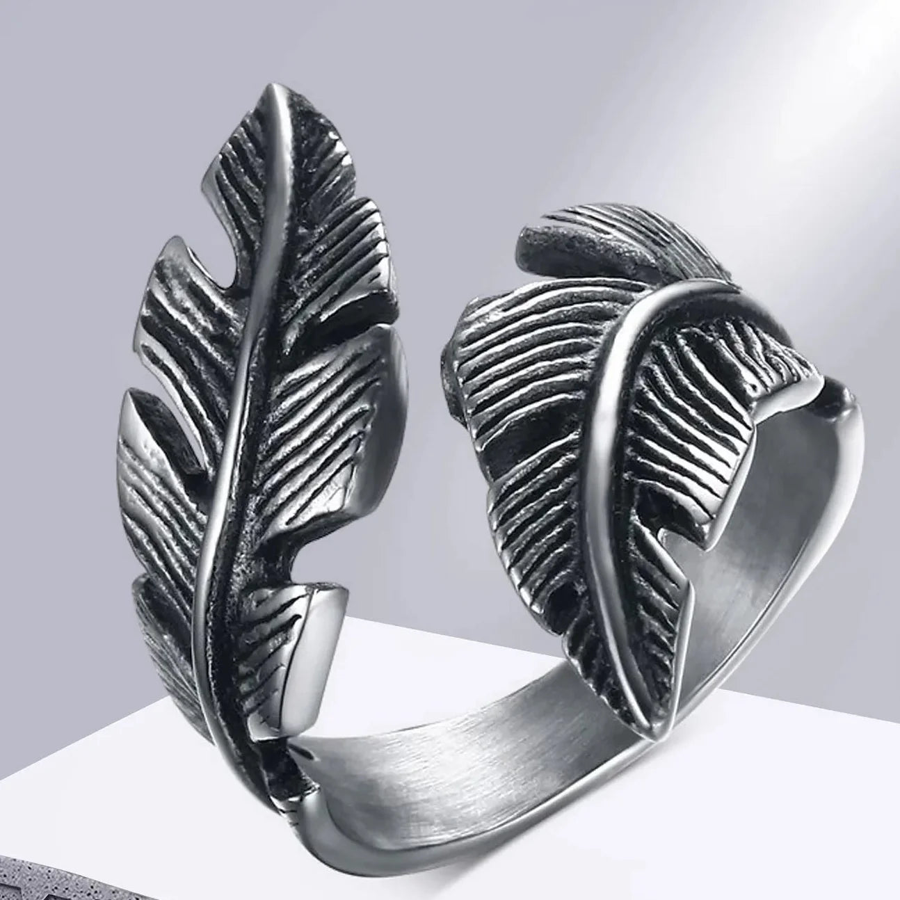 Adjustable silver feather ring