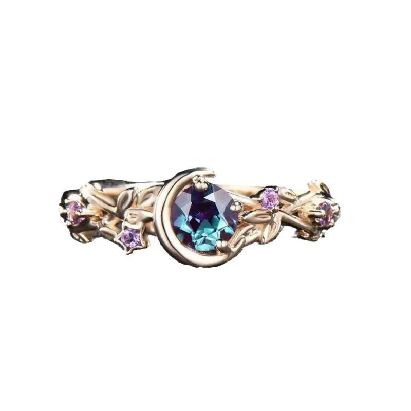 Ring with Crescent Moon and Gold Zircon