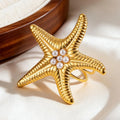 Gold starfish shell ring