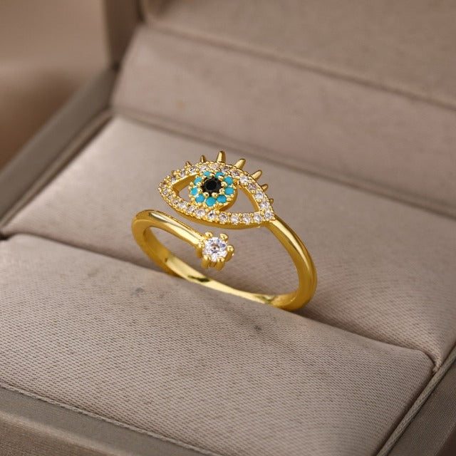 Diamond Ring against the Blue Greek Turkish Evil Eye Matiasma Mataki Gold