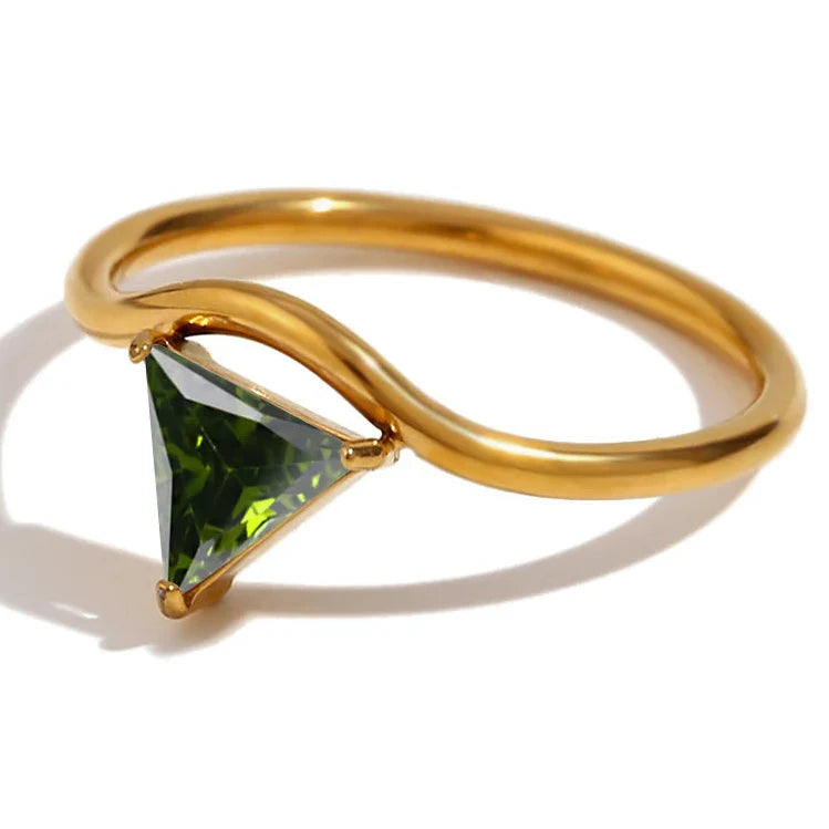 Gold ring with triangular birthstone August