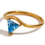 Gold ring with triangular birthstone December