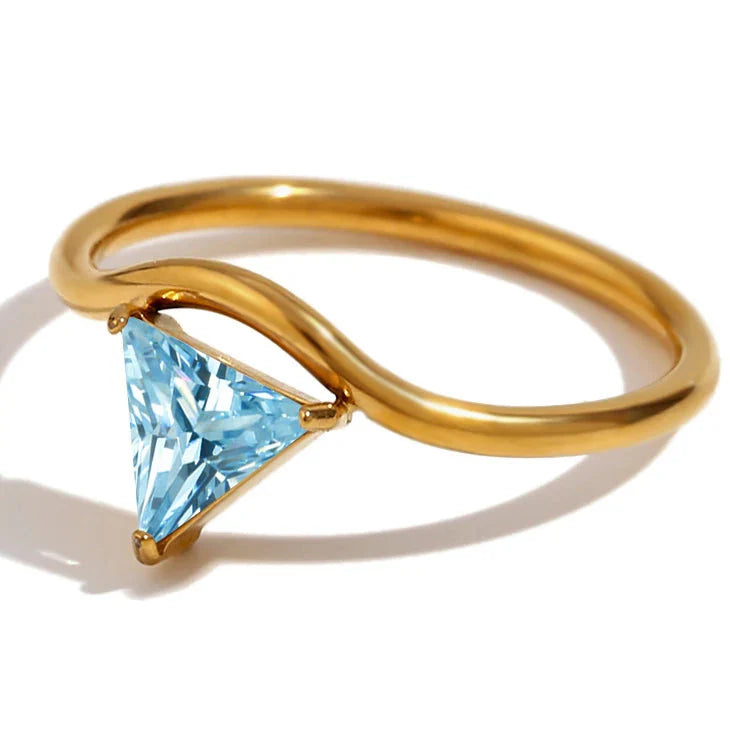 Gold ring with triangular birthstone March