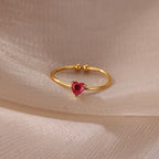 Delicate gold-plated ring with heart-shaped birthstone