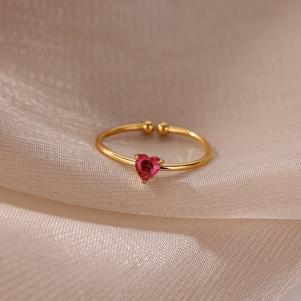 Delicate gold-plated ring with heart-shaped birthstone