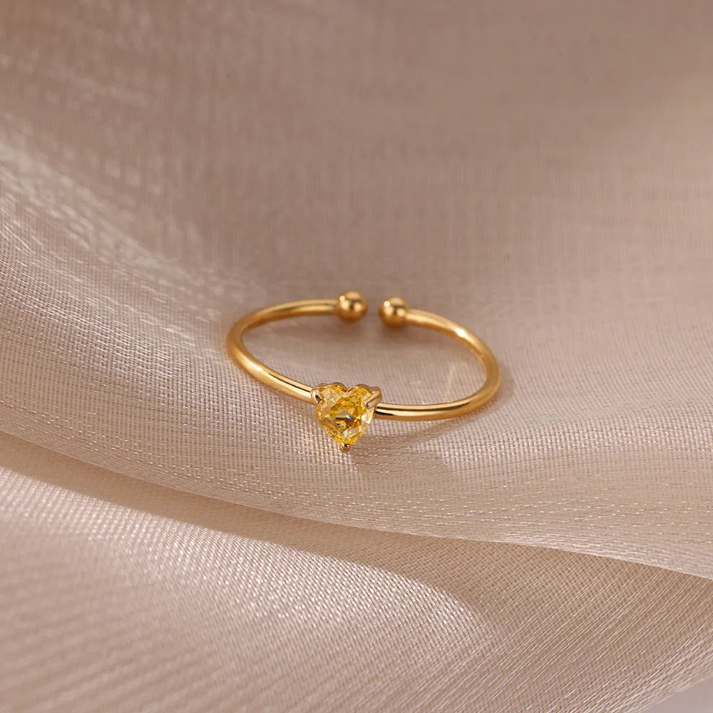 Delicate gold-plated ring with heart-shaped birthstone