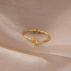 Delicate gold-plated ring with heart-shaped birthstone