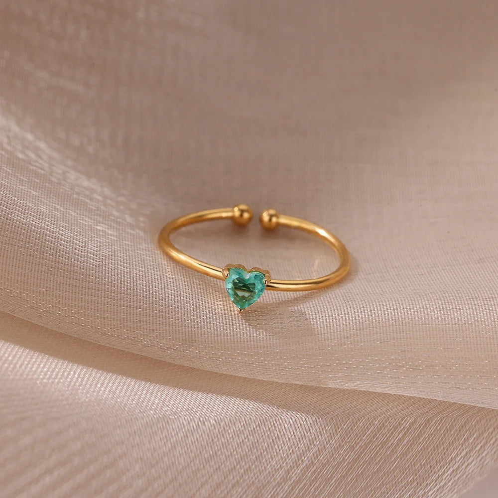 Delicate gold-plated ring with heart-shaped birthstone