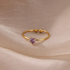Delicate gold-plated ring with heart-shaped birthstone