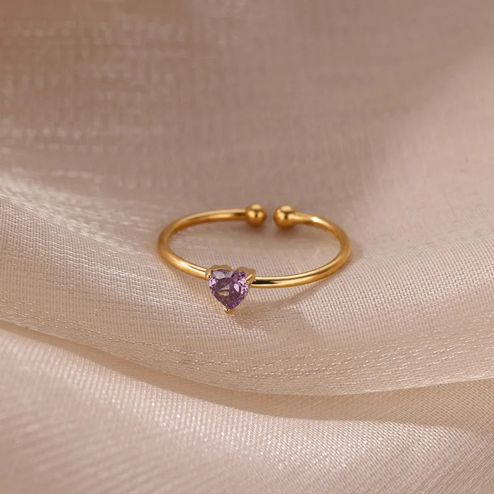 Delicate gold-plated ring with heart-shaped birthstone