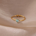 Delicate gold-plated ring with heart-shaped birthstone