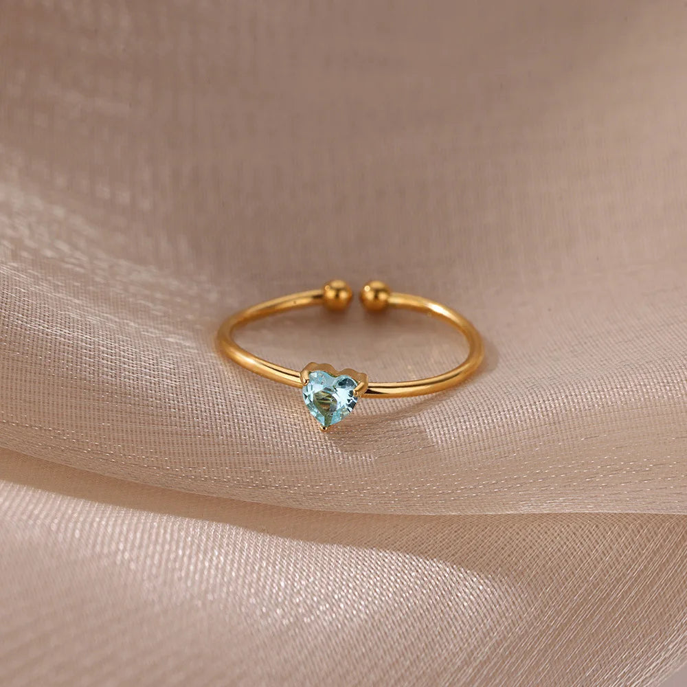 Delicate gold-plated ring with heart-shaped birthstone