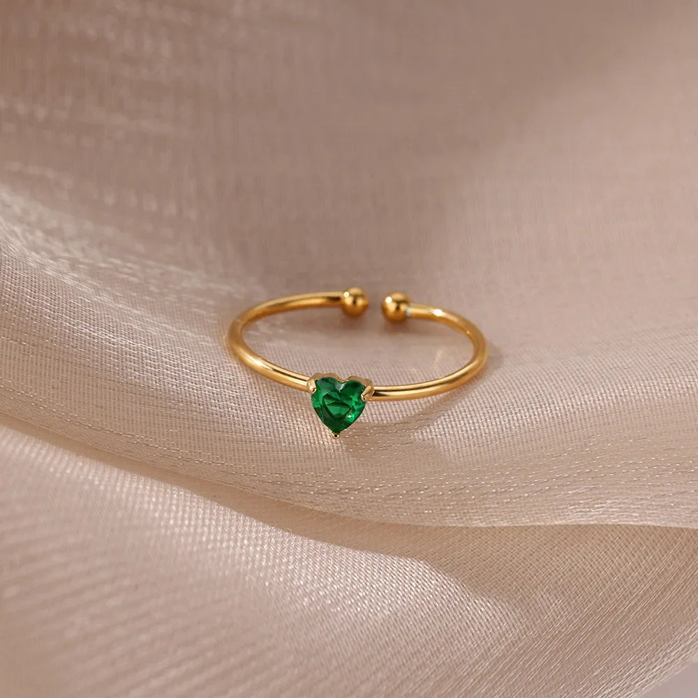 Delicate gold-plated ring with heart-shaped birthstone