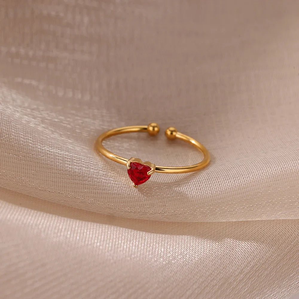 Delicate gold-plated ring with heart-shaped birthstone
