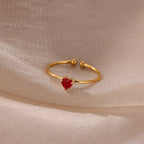 Delicate gold-plated ring with heart-shaped birthstone
