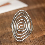 Wide textured spiral ring in silver