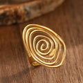 Wide textured spiral ring in gold