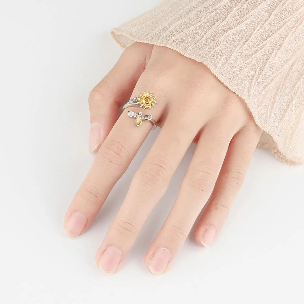 Bee and rotating flower ring