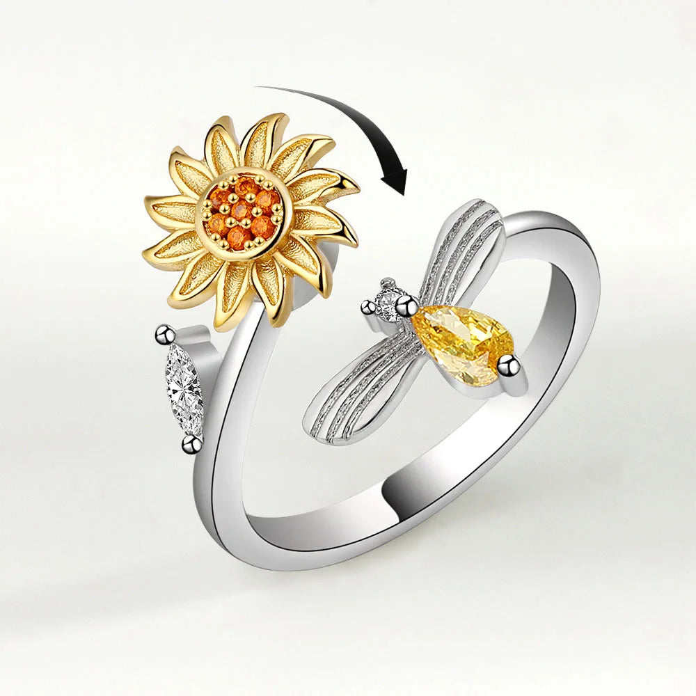 Bee and rotating flower ring