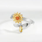 Bee and rotating flower ring