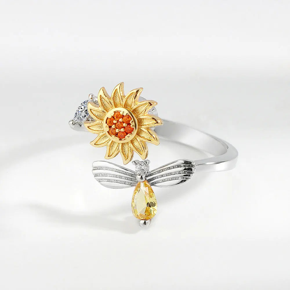 Bee and rotating flower ring