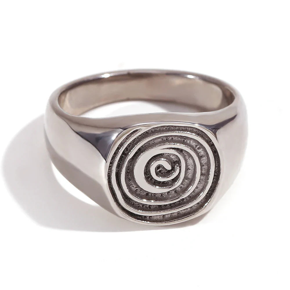 Signet ring with engraved spiral motif silver