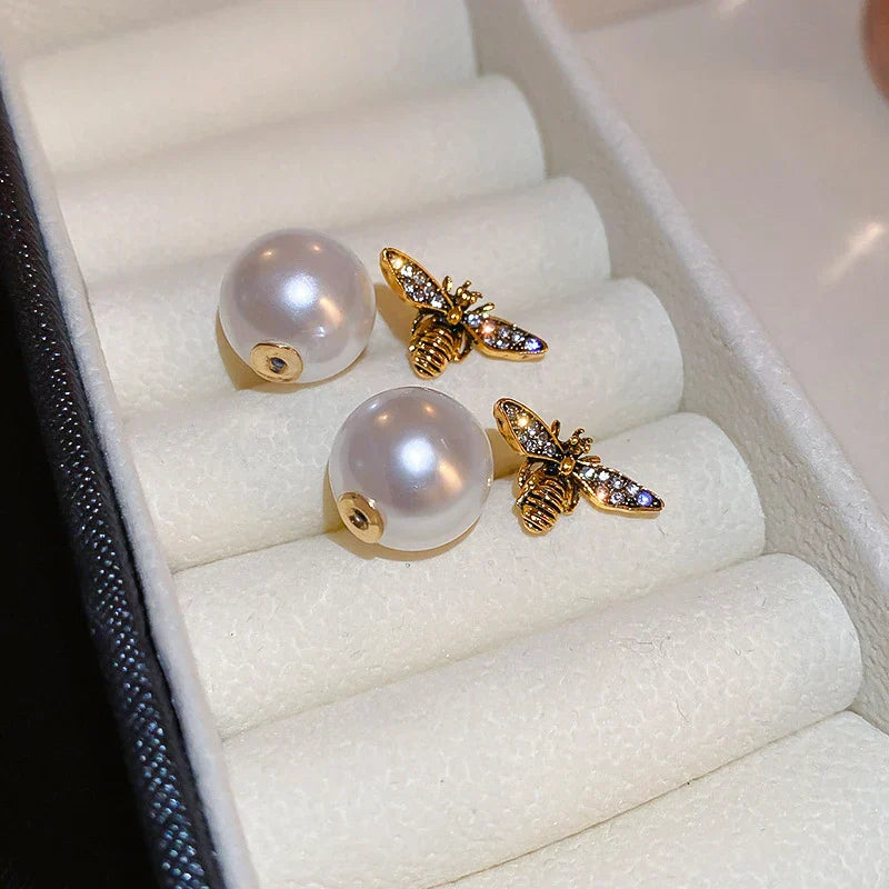 Bee and white pearl earrings