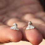 Mountain Stud Earrings in Silver


Material: steel


Colors: silver


Size: 1 cm diameter (see image)


Guaranteed allergen-free, suitable for men, women, boys, or girls


Highly crafted product