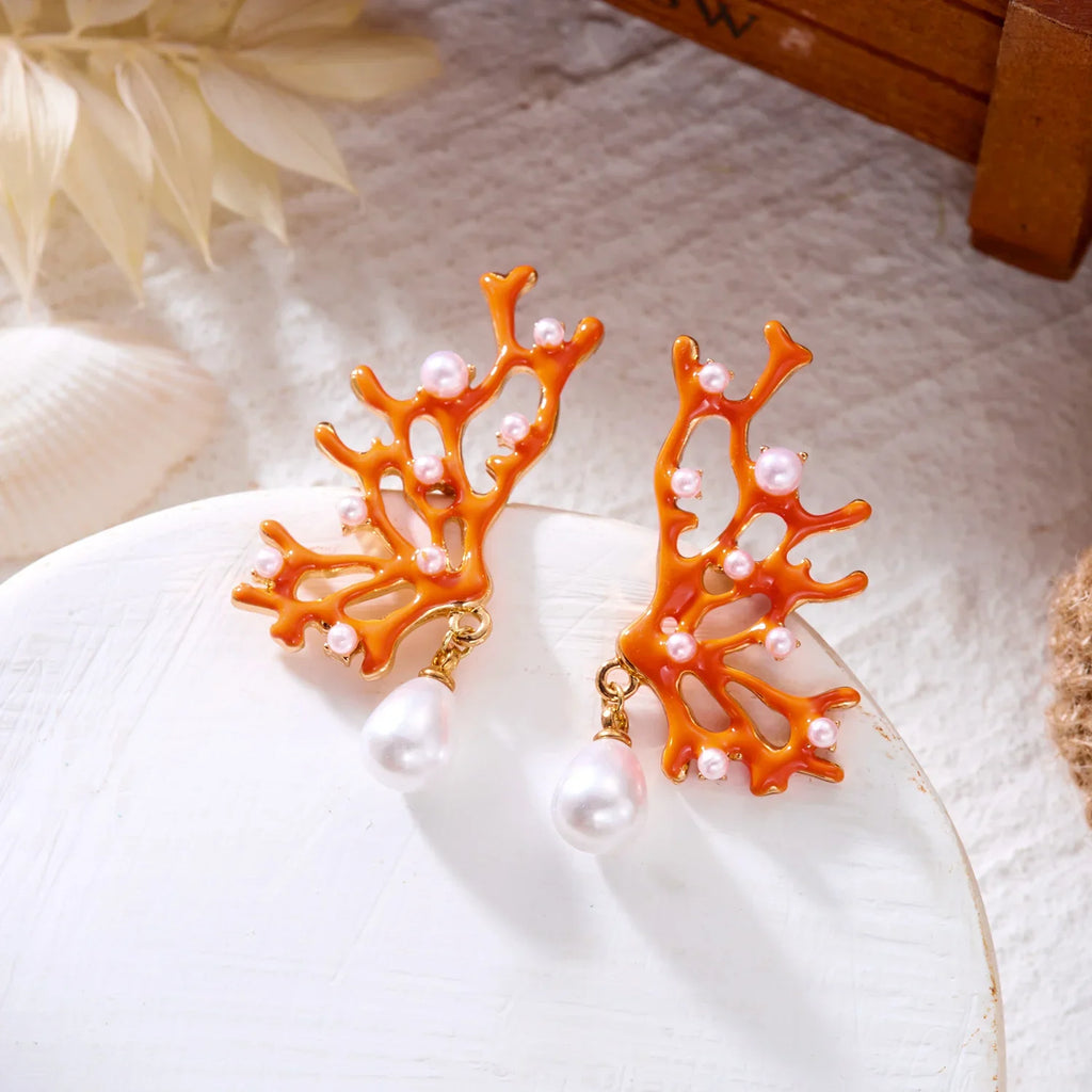 Orange coral and pearl earrings