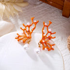 Orange coral and pearl earrings