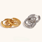 Gold hoop earrings with spiral motif