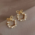 Hoop Earrings with Pearls and Bow Tie