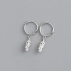 Hoop earrings with small dangling feather, silver