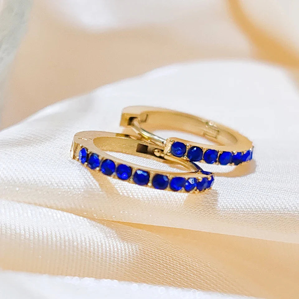 Gold hoop earrings with September birthstone for women