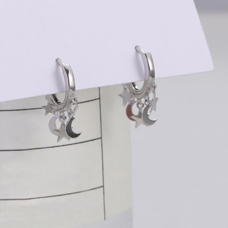 Star and Moon Dangle Hoop Earrings in silver