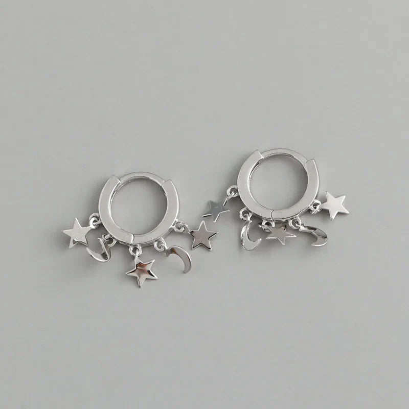 Star and Moon Dangle Hoop Earrings in silver