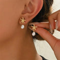 Gold-plated shell, starfish and pearl earrings