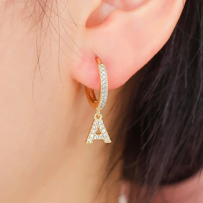 Women's hoop earrings with initial