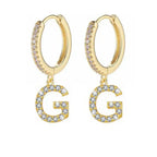 Women's hoop earrings with initial g