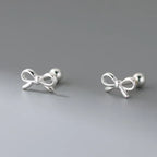 Minimalist bow tie earrings in silver