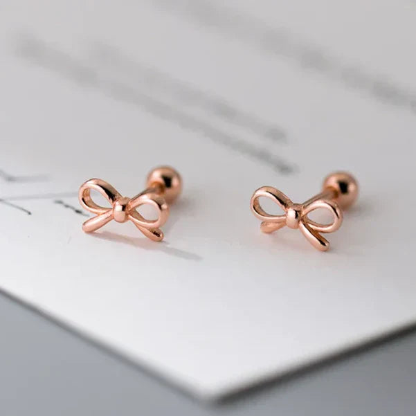 Minimalist bow tie earrings in rose gold