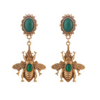 Green bee dangling earrings