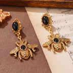 Black bee dangling earrings