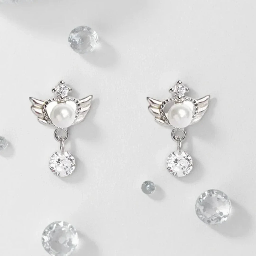 Dangling angel wing earrings