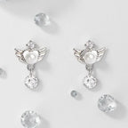Dangling angel wing earrings